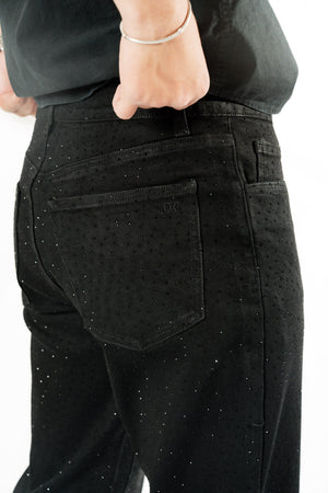 Pantalon de hombre negro con brillos detalle trasero de bolsa