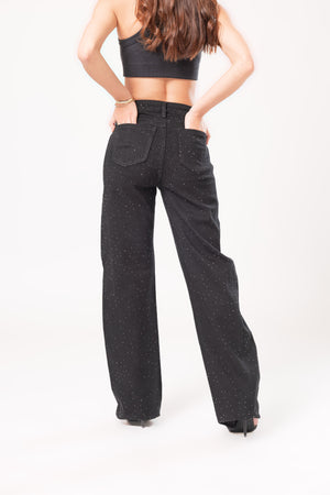 pantalon wide leg negro con brillos de mujer vista trasera con bolsillos